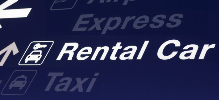 Direction Sign at the airport for car rental desks